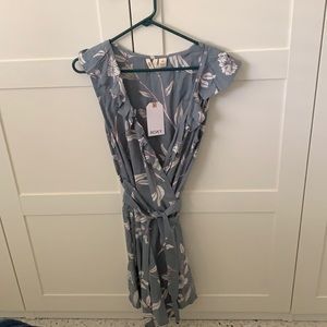 Foxy sleeveless wrap dress